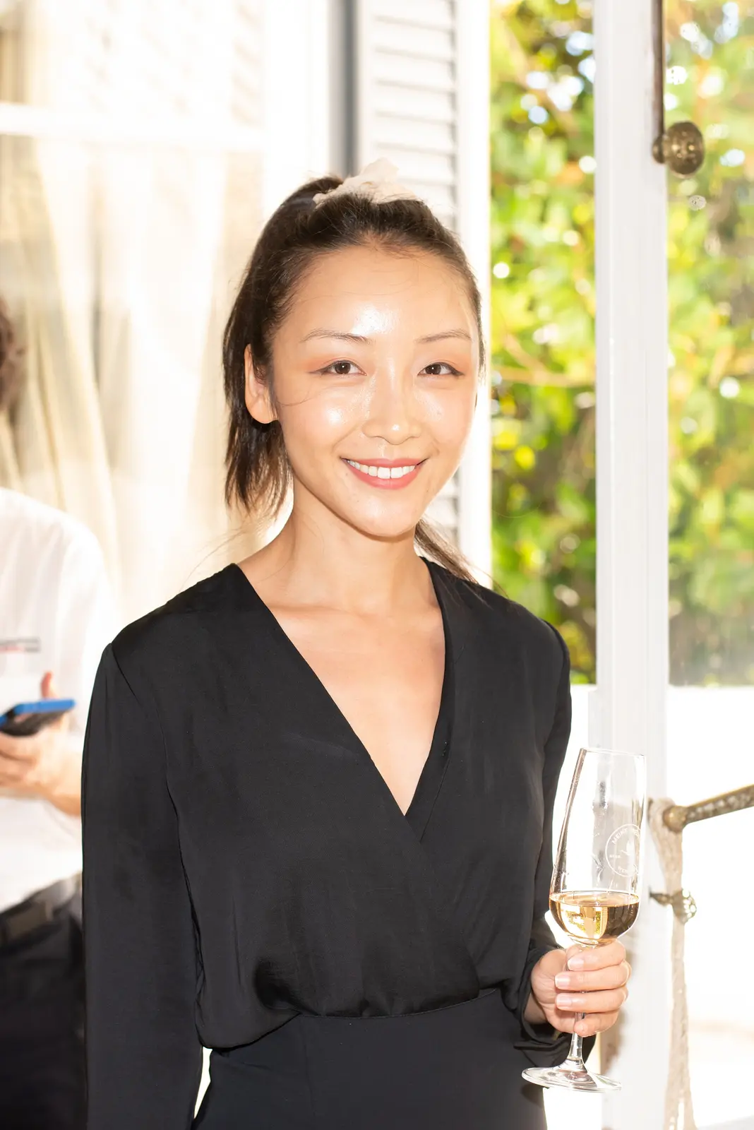 Thoughtful reflection in event photography at a lively event