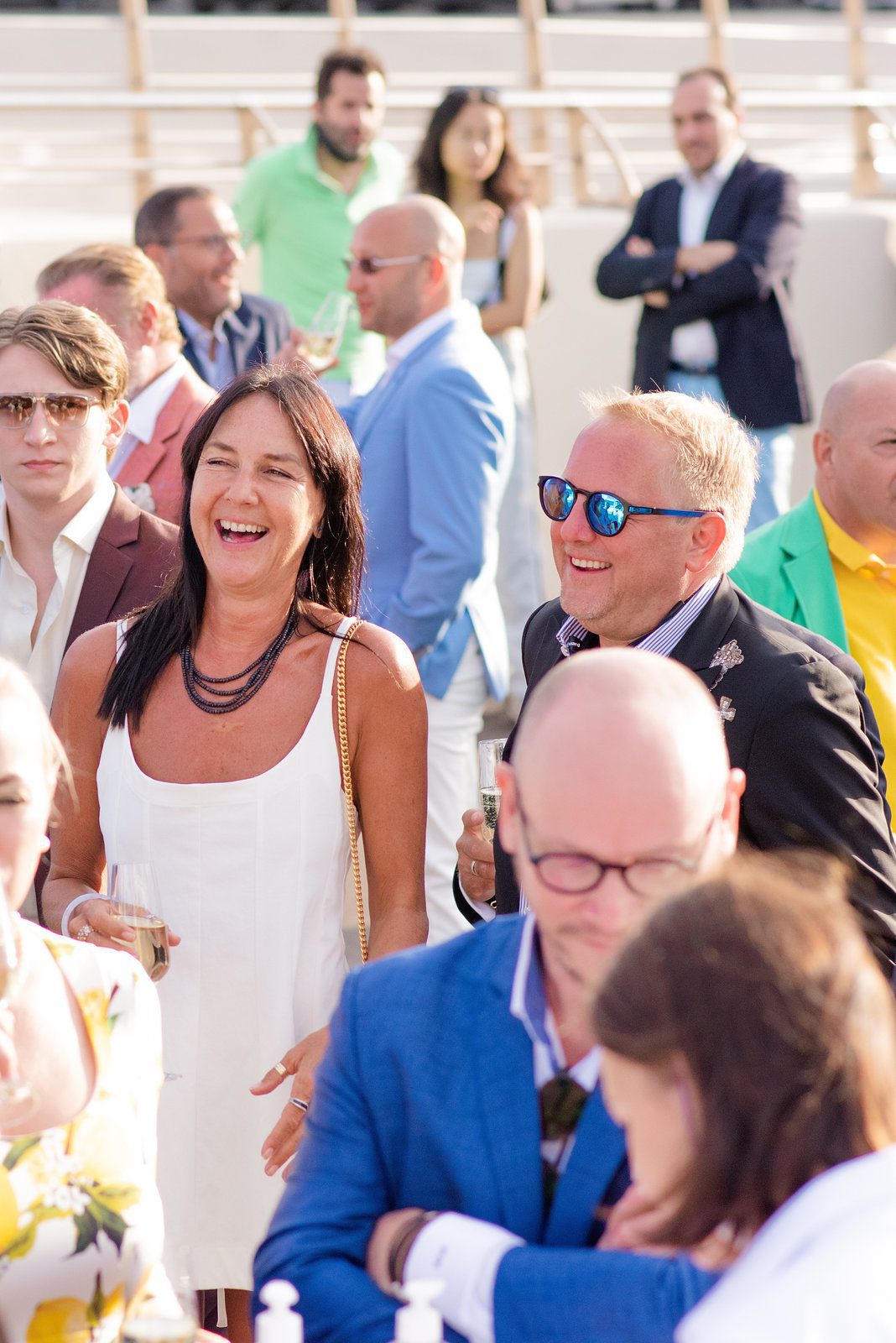 Lively vibe in event photography at a stylish French gathering