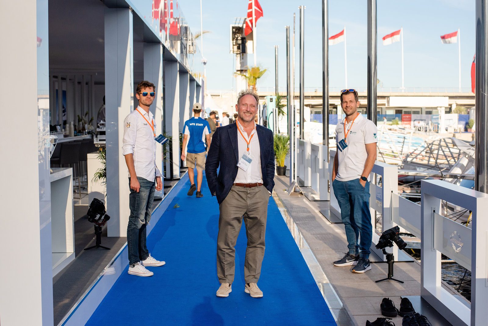 Poised grace in event photography at a vibrant yacht gathering