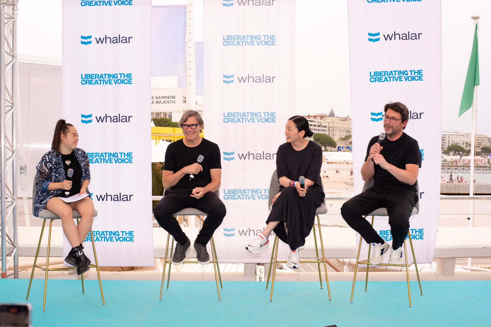 Lively atmosphere in event photography at a stylish coastal gathering