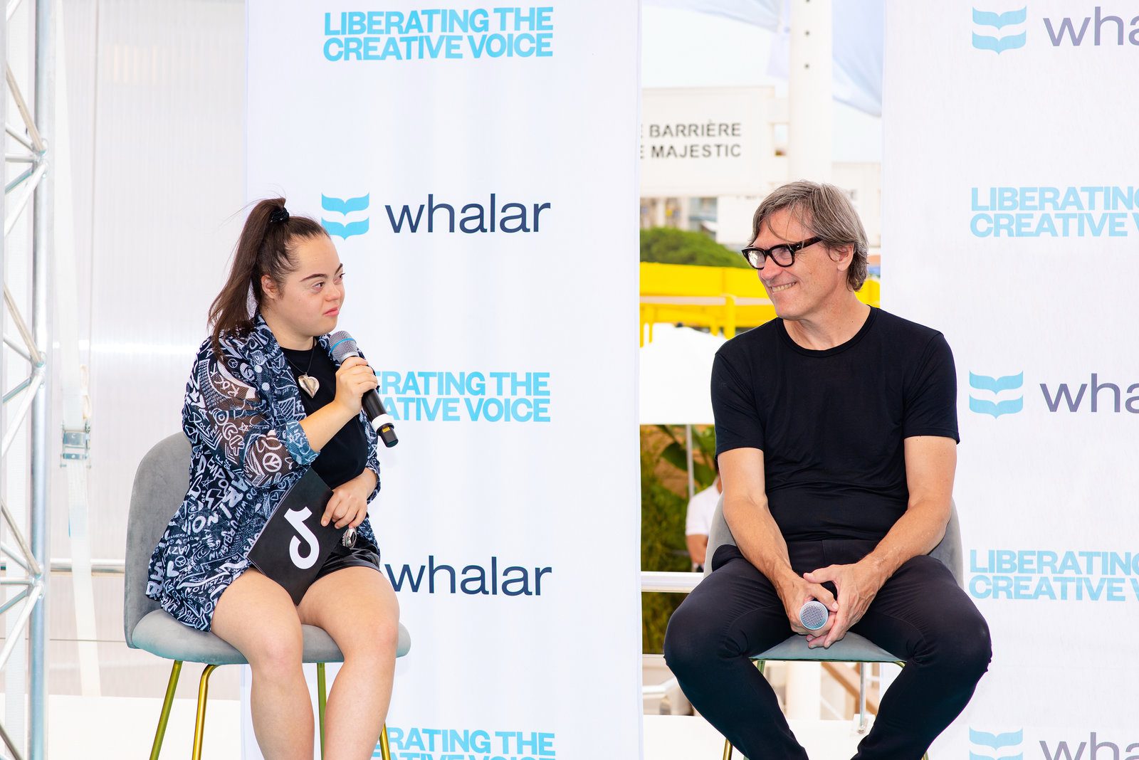 Dynamic perspective in event photography at a vibrant coastal event