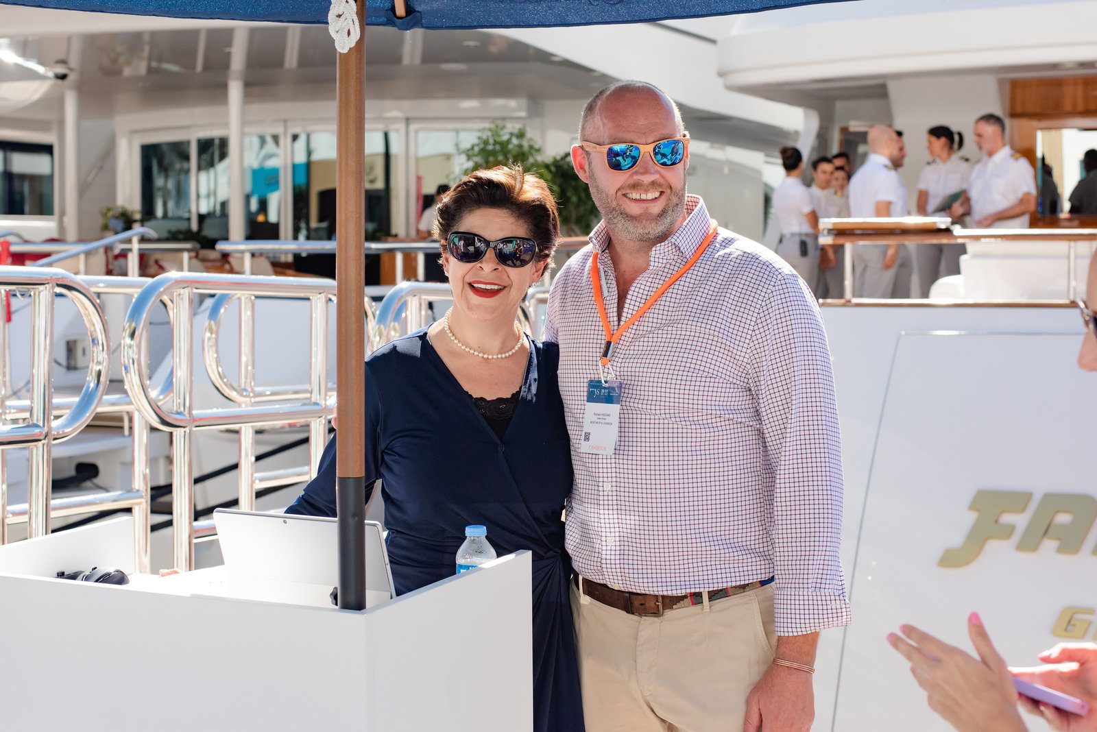 Glamorous moment in event photography at a luxurious yacht event